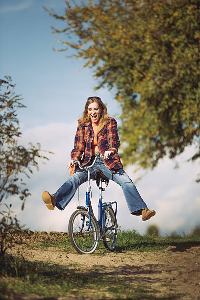istock Vintage woman portrait on bicycle 517321237