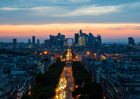 View of the business district of the Paris Le Defence form the Arch of Triumph at sunset, France