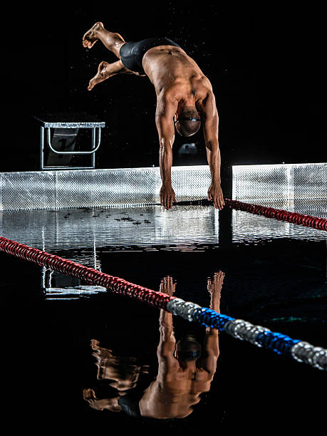 istock Male Swimmer In Mid-Air 517326419