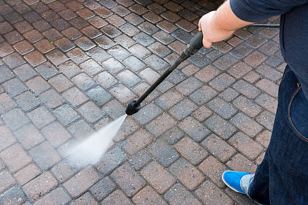 istock Pressure washer courtyard with paving stone 517328589