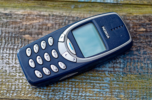 London, England - March 22, 2016: Nokia 3310 Mobile Phone, First Introduced in September 2000, It was one of Nokia's most successful models.