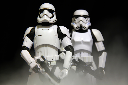 Vancouver, Canada - January 25, 2016: A pair of stormtrooper models from the Star Wars film franchise. One is from the original trilogy, the other from the newest film. The toys are part of the Black Series, from Hasbro.