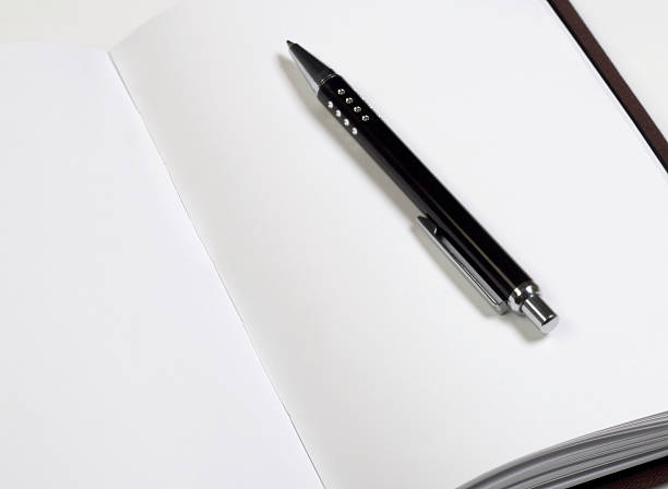 istock Book and pen close-up 517338334