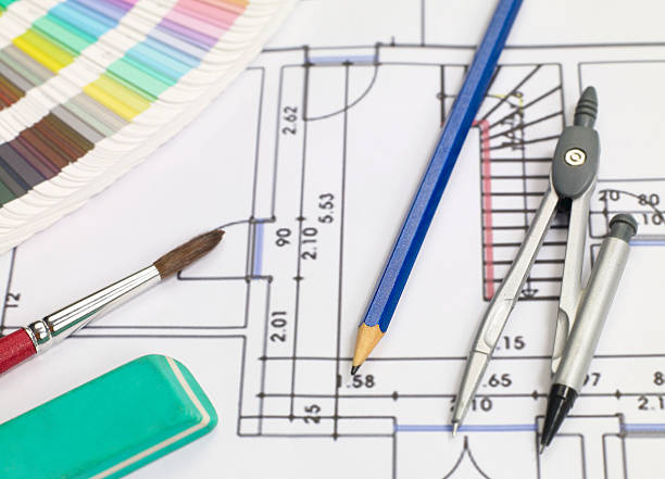 istock Blueprints and office supplies 517340762