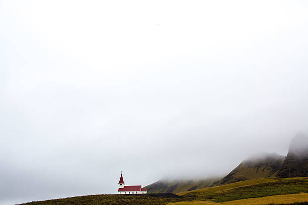 istock Church sits in front of Icelandic mountains 517341032