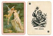 Joker playing card plus back fairies kissing Goodall 1890s