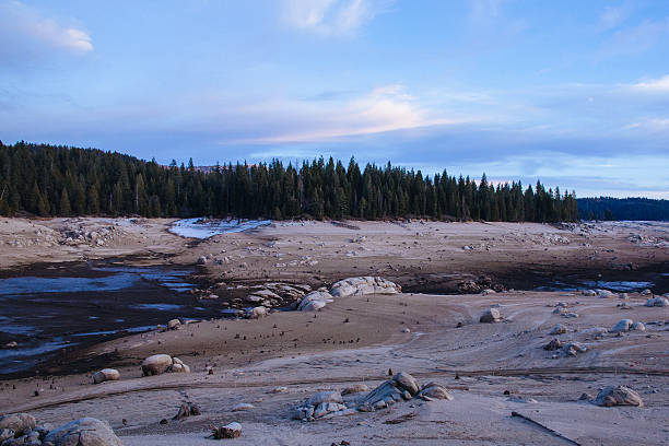 Drained Reservoir in Sierra Nevada, California stock photo