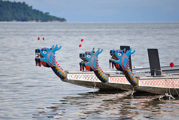 istock Selective focus of three dragon boat's head 517341480