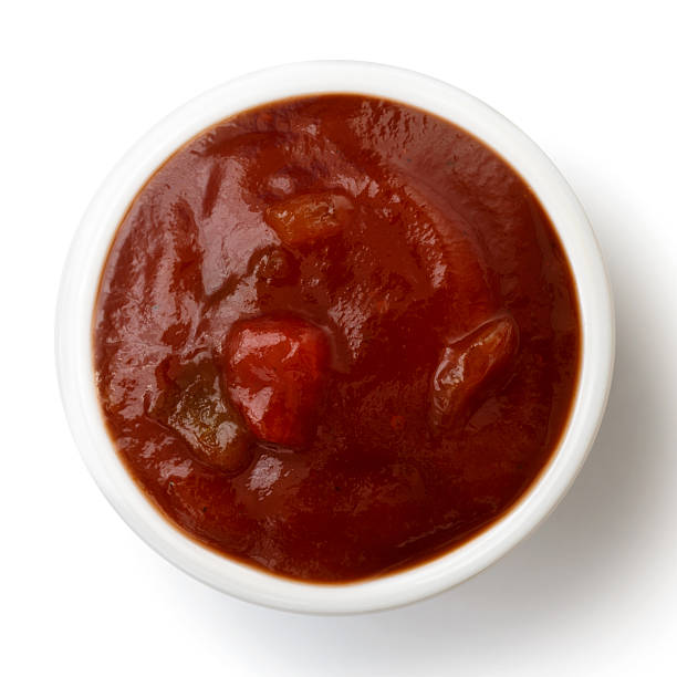 istock Small condiment bowl of  tomato and red chilli pepper salsa. 517341782