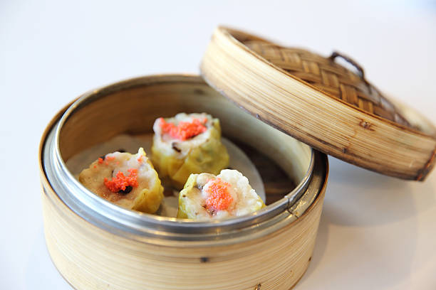 istock shumai , dim sum in bamboo steamer 517341824