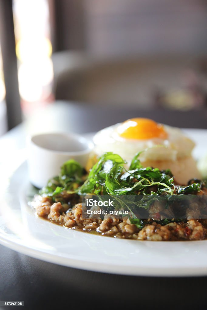 Rice with stir fried pork and basil Rice with stir fried pork and basil with egg Adulation Stock Photo