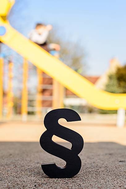 istock Black paragraph symbol on children playground. 517342478