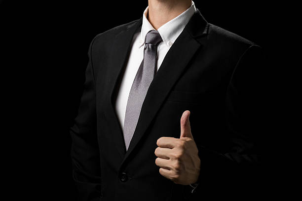 istock businessman thumb up.good sign 517343314