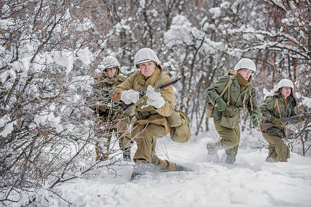 istock World War II Soldiers in the Snow 517343662