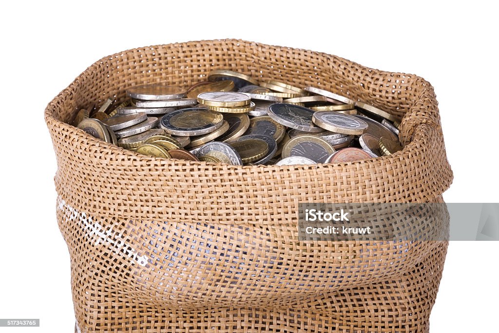 Money bag with coins isolated at a white background Money bag with coins isolated at a white background, isolated over white Bag Stock Photo