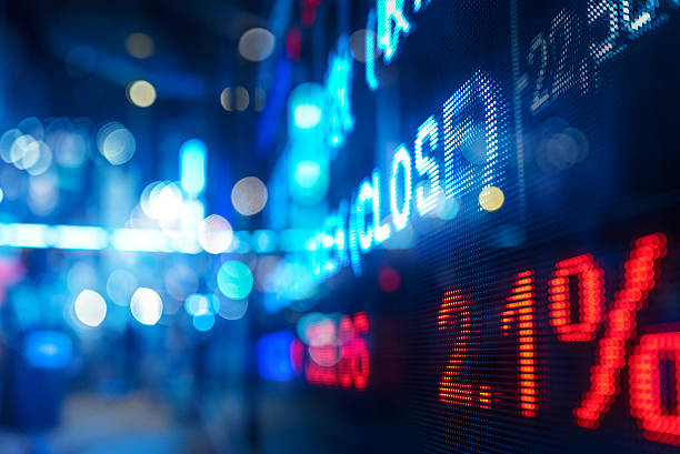 istock display stock market numbers and graph 517344126