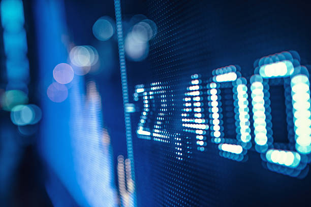 istock display stock market numbers and graph 517344166