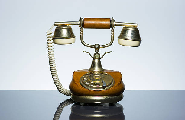 istock Elegant vintage phone on grey background 517344558
