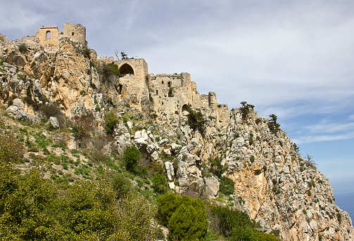 Taormina, Sicily, Italy - April 28, 2023: Ancient theatre of Taormina (Teatro antico di Taormina), ruins of ancient Greek theatre, built in Hellenistic era with a view of Mount Etna volcano