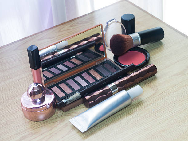 istock make up brushes in holder and cosmetics 517345535