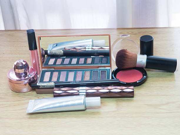 istock make up brushes in holder and cosmetics 517345537