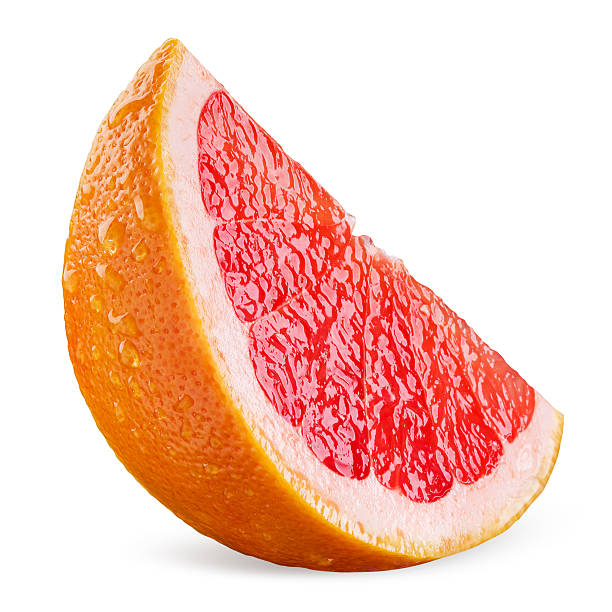 グレープフルーツのスライスに滴白背景 - citrus fruit portion grapefruit fruit ストックフォト�と画像