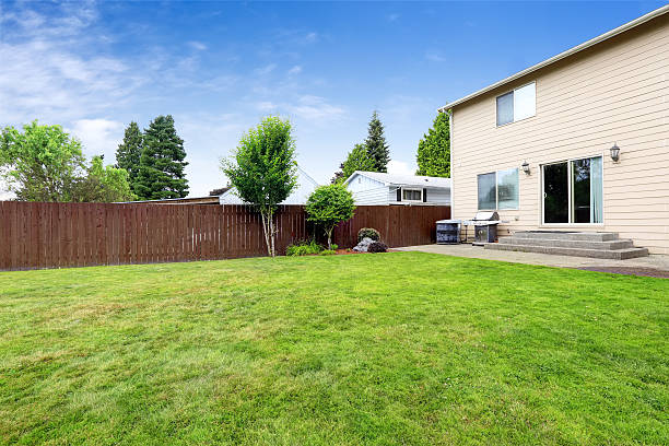 istock House exterior with walkout patio and spacious backyard area 517345663