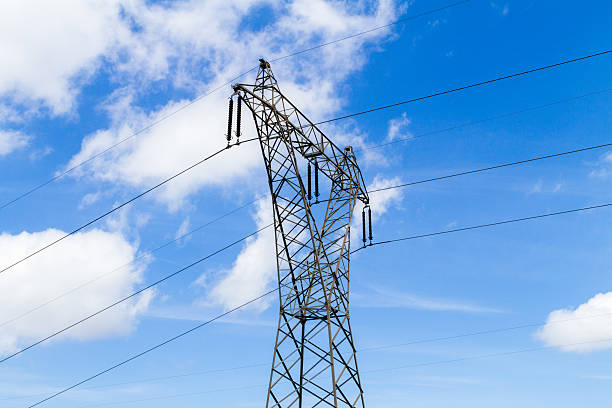 istock Steel pylon with high voltage distribution powerlines 517347170