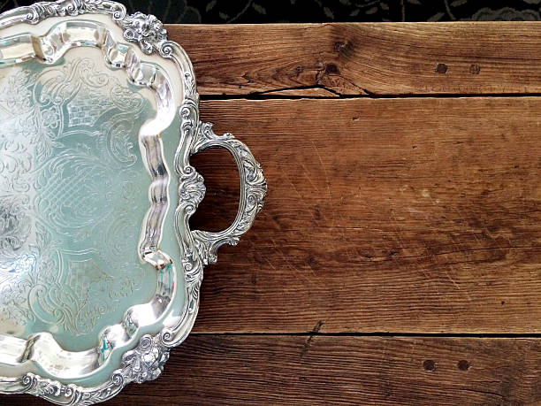 istock Silver Tray on a Wood Countertop 517348168