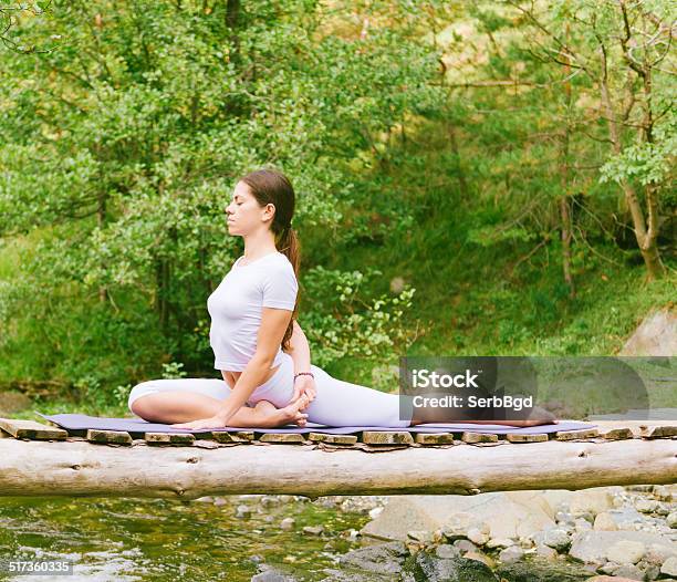 Woman Doing Yoga In Nature Stock Photo - Download Image Now - Adult, Adults Only, Balance