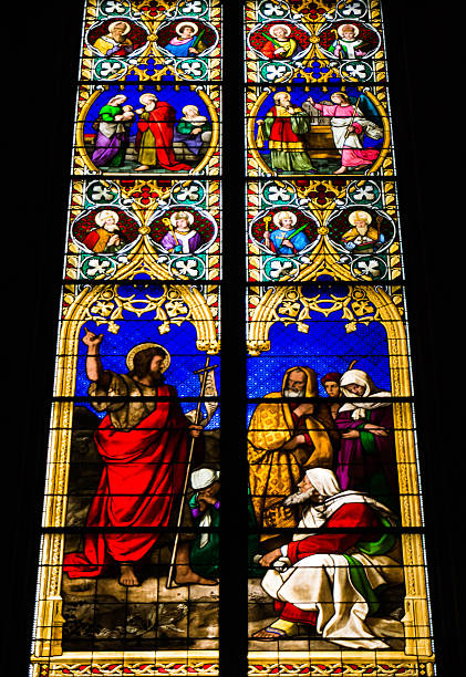 istock COLOGNE, GERMANY - SEPTEMBER 21: Stained glass church window wit 517360643