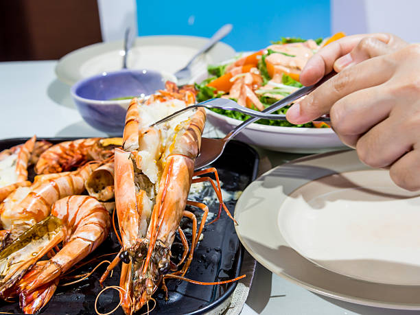istock Dinner at restaurant, roasted black tiger shrimp menu 517365053