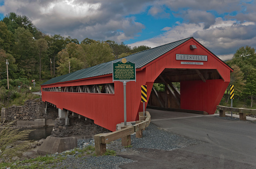 The Taftsville Covered Bridge constructed entirely of local wood and stone in 1836 and it is the oldest covered bridge in Windsor County Vermont.