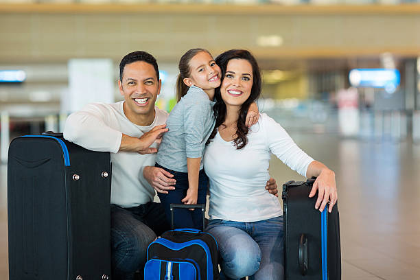 istock family at airport 517365731
