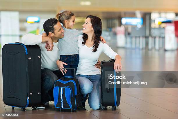 Family Hugging At Airport Stock Photo - Download Image Now - Family, Airport, Suitcase