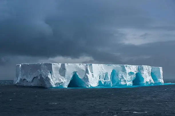 Photo of Large tabular iceberg floating in Antarctica