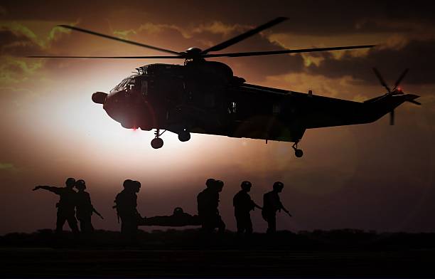 istock Military rescue helicopter during sunset 517369404