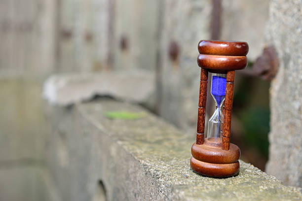The hourglass is the loss of our most desired time The sandglass remembers the time we lost short length stock pictures, royalty-free photos & images