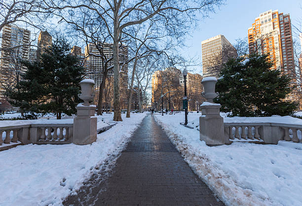 Winter Scene in Rittenhouse Square Philadelphia, PA Snow Covered Rittenhouse Square in Philadelphia, PA after Blizzard Jonas philadelphia winter stock pictures, royalty-free photos & images