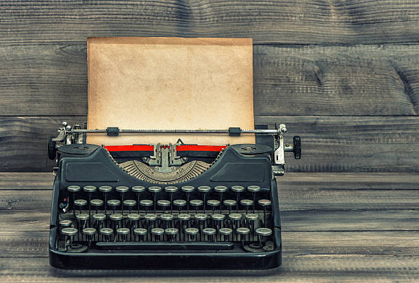 istock Antique typewriter with grungy textured paper page 517372160