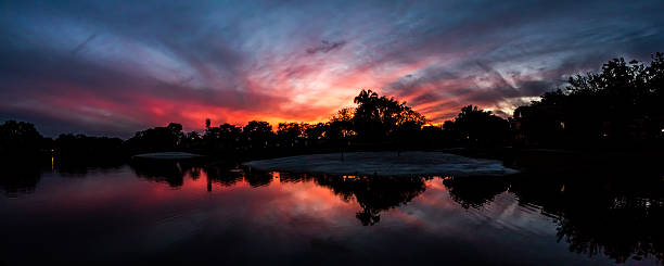 Sunset, Lake at The Hammocks, Kendall, Florida Sunset, Lake at The Hammocks, Kendall, Florida kendall stock pictures, royalty-free photos & images