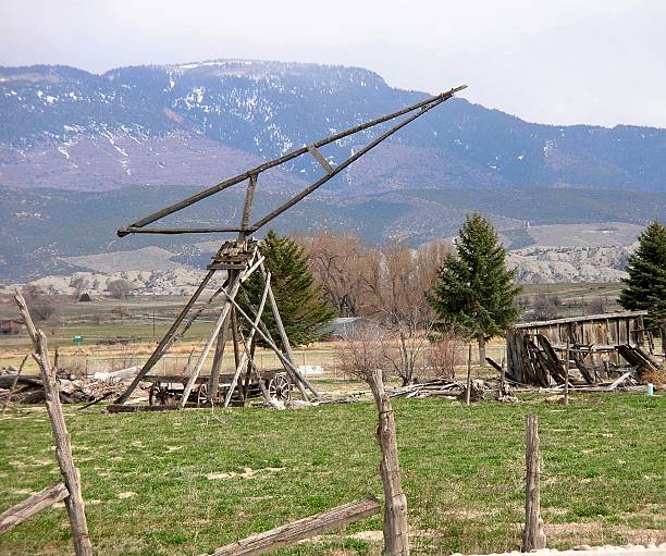 istock Old hay derrick and wagon 517373294