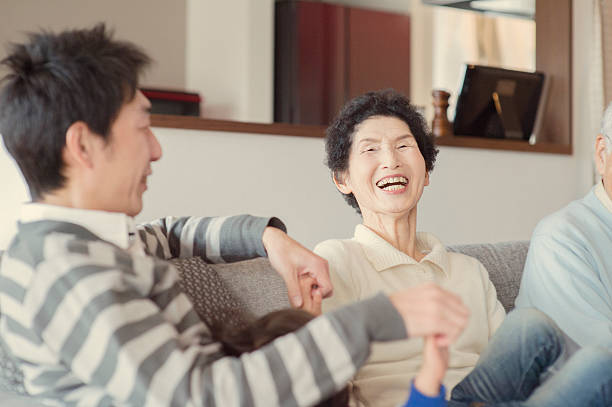 istock Multi-generation family having fun in the living room 517373896