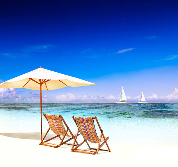 istock Deck Chair on the Trapical Beach Ocean Concept 517374736