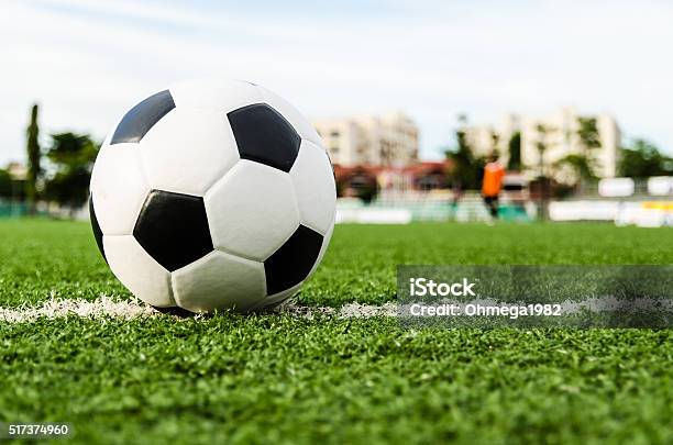 Soccer Ball On The Green Grass Of Soccer Field Stock Photo - Download Image Now - Soccer, Turf, Soccer Ball