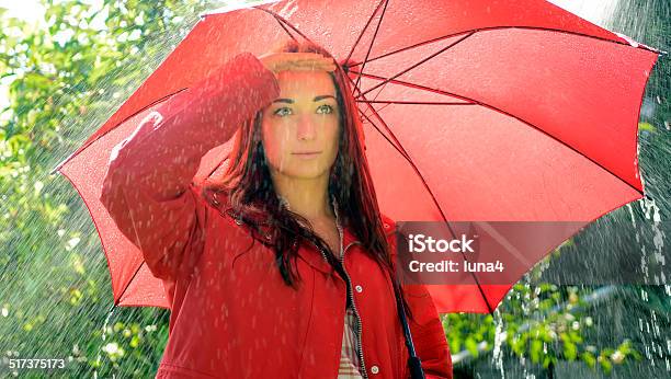 Woman Looking For Rain Stock Photo - Download Image Now - Adult, Adults Only, Autumn