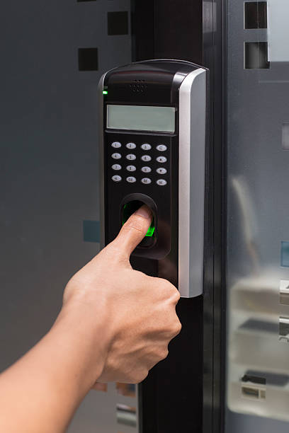 istock fingerprint and password lock in a office building 517375328