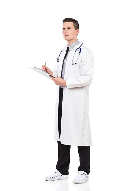 istock Thnking male doctor with a clipboard 517375529