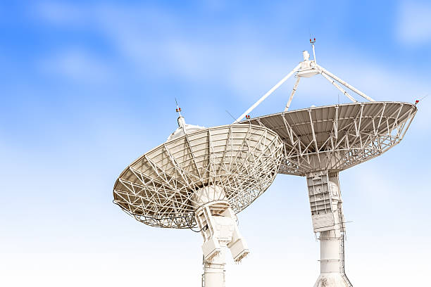 istock satellite dish antenna radar big size isolated on blue sky 517376644