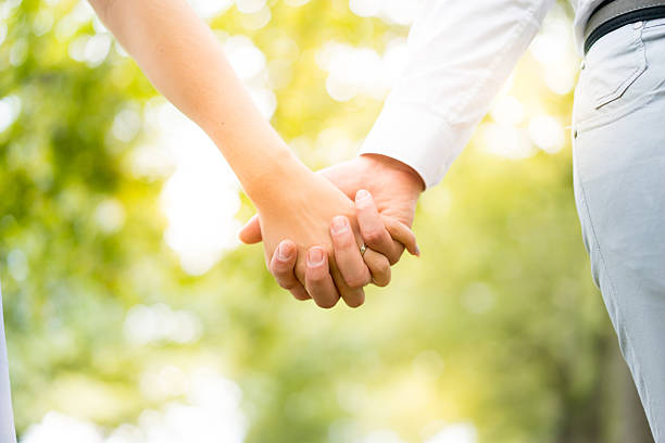 istock Young couple walking, Hyde Park, London: sunset colour tone 517376708